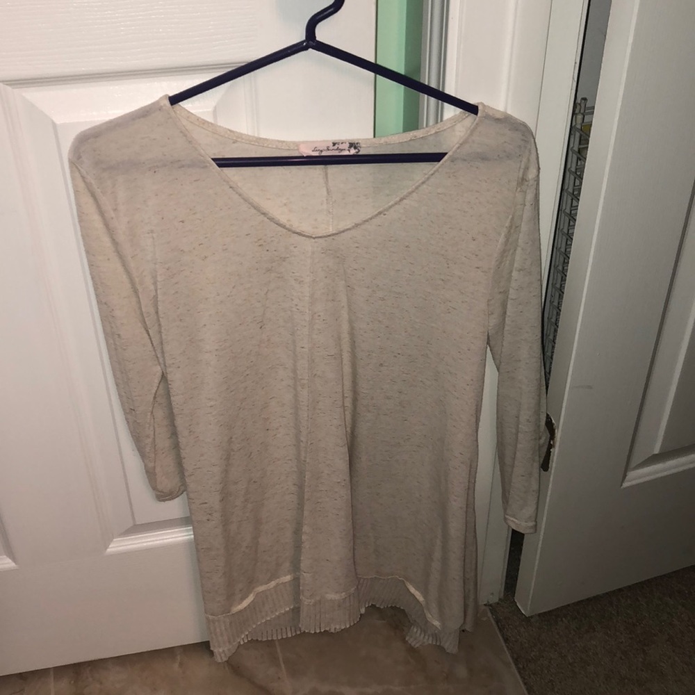 Tan long sleeved camisole.